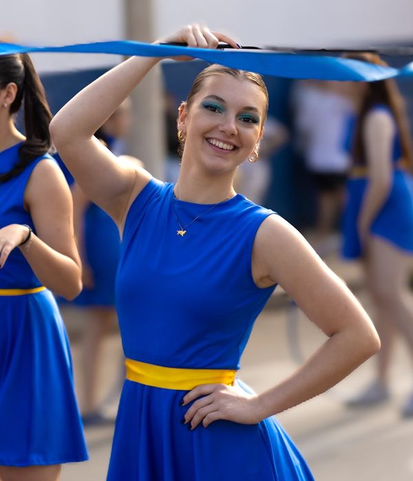 Woman feeling energetic and vibrant during a dynamic movement session.